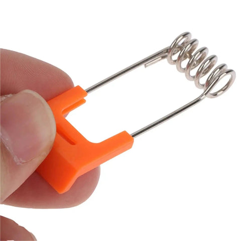 Lawsen Spring Clips Recessed Lighting 20PCS Steel Spring Clamps for LED Downlight Panel Light Ceiling Circlip with Rubber Sleeve, orange clip with metal spring in hand.