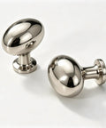 Top Shelf Slick Titanium Silver Mushroom Cabinet Knobs And Drawer Pulls For Kitchen Bathroom And Dresser Crafted From Rock Solid Zinc Alloy With Polished Chrome Finish Modern Minimalist Furniture Hardware 6 Pack Set, showing two polished knobs.