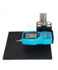 Portable Digital Surface Roughness Tester SR200 With Hella Clear Two Point Four Inch Backlit LCD and Super Fast Charging handheld profilometer measuring surface texture on a flat surface.