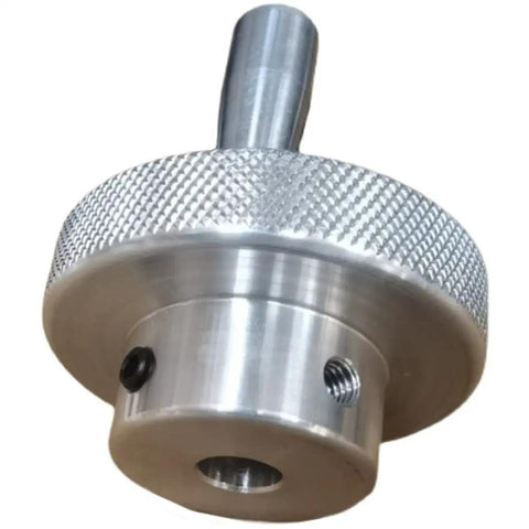 Two Inch Round Hand Wheel With Revolving Knob Handle For Milling Drilling Lathe Machines Precision Adjustment And Easy Grip For CNC And Manual Operation In Shop, showing aluminum finish and hole.