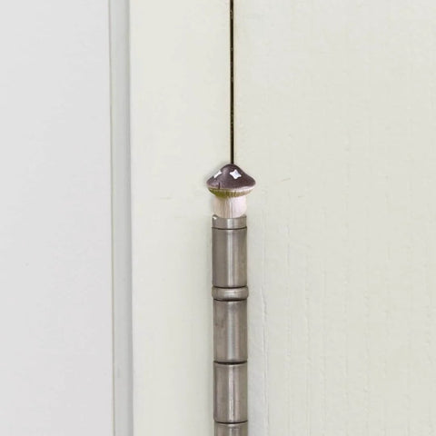 Decorative Hinge Head Topper Set Of 6 Magnetic Mushroom Hinge Heads for doors, shown on a cabinet hinge, adds quirky home accent