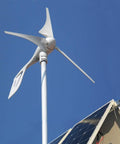 Wind Turbine Generator 400W 12V With Three Blade Nylon Carbon Fiber Blades For Home Use, Low Wind Speed Starting At Two Point Five Meters Per Second, Includes Charge Controller And Efficient Windmill installed on rooftop