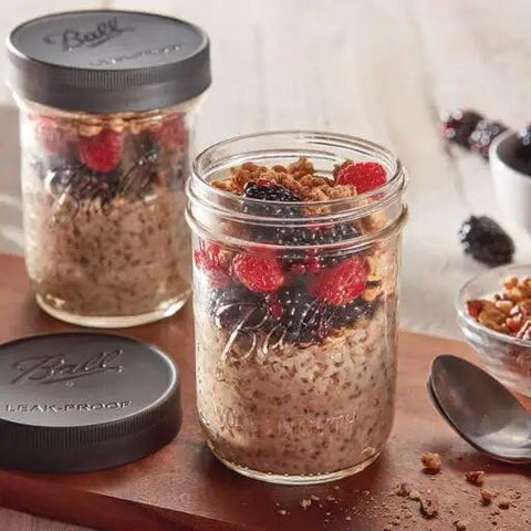 Awesome Leak Proof Plastic Lids for Wide Mouth Mason Jars for canning, featuring BPA free lids with ridge edge grip, shown on jars with breakfast parfait.