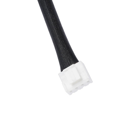 Automotive electrical connector on black braided hose; white plastic end, close-up.