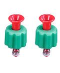 Two green plastic pressure relief valves with red push buttons and threaded metal ends for backpack garden sprayers