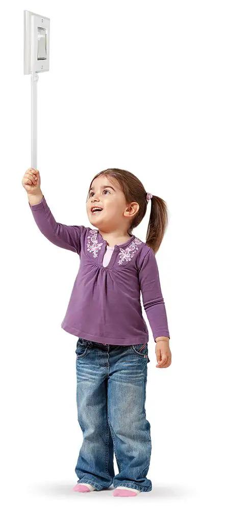 Child using Light Switch Extender For Kids 2 Pack With A 12 Inch Extension Handle Fits Decora And Rocker Style Switches Durable Plastic Made In USA