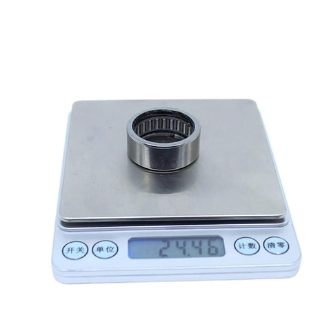 Heavy Duty Drawn Cup Needle Roller Bearing 282 By 352 By 148 Millimeters on scale showing weight 24.46 grams.