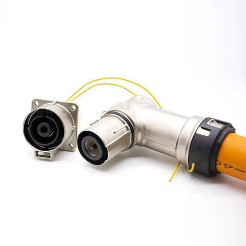 Kickass High Voltage Connector Right Angle Plug Socket For Electric Vehicles 500A with steel casing and yellow wires.