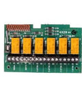 Upgrade Your Security Rig With This Solid Four Zone Relay Module, featuring six yellow relay switches and a green circuit board.