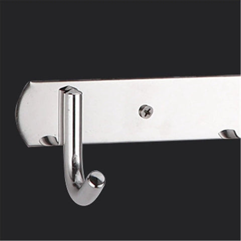 Close-up of the Total Game Changer Wall Mount Coat Rack Flip Down Swivel Hooks Sculptural Polypropylene Art for Bathroom Kitchen.
