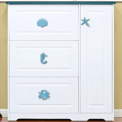 4 Piece Mediterranean Blue Iron Cabinet Knobs Set With Seahorse, Starfish, Crab, And Shell Handles on white cabinet