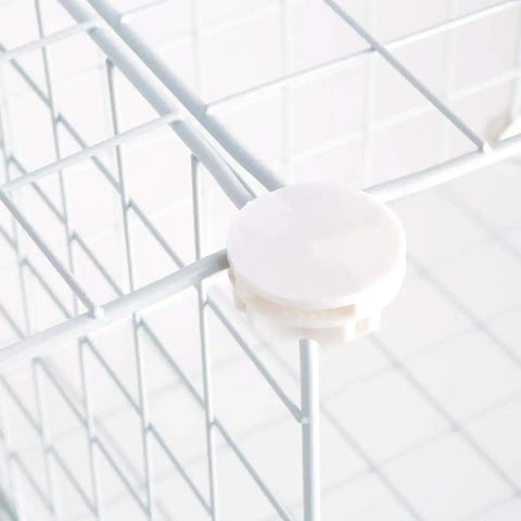 Close-up of assembly connector on Premium Wire Cube Storage Organizer for home and garage four cube shelving unit heavy duty wire construction.