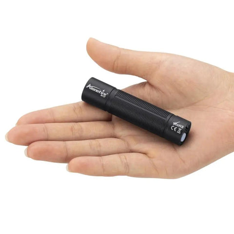 Compact 365nm UV Blacklight With USB C Rechargeable Battery held in hand for size comparison