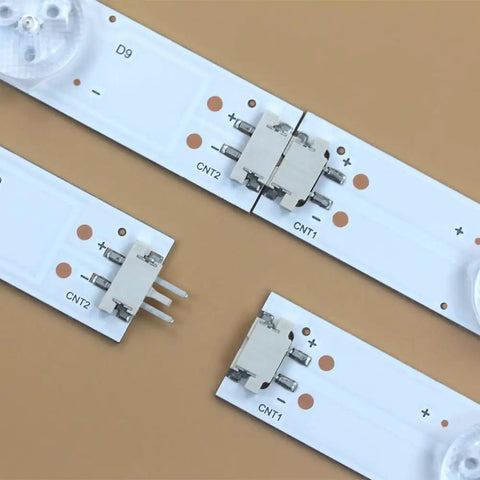 Close-up of connectors on 12 Pack LED Backlight Strips For TV LB70006 E70 E3 Replacement Kit, showing CNT1 and CNT2 connections.
