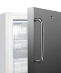 Real Deal Upright Commercial Freezer Built Like A Tank With Reliable Manual Defrost And Spacious 2.47 Cubic Feet Storage For Any Serious Kitchen Hustle In Sleek Stainless Steel Finish showing door handle and storage shelves.