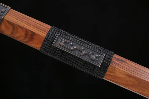 Close-up of Hand-Forged Damascus Han Sword With 42-Inch Battle-Ready Chinese Longquan Blade, rosewood handle, kirsite fittings.