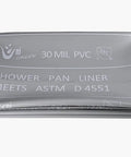 PVC Shower Pan Liner 30 Mil Thick In Grey, folded and labeled, showing certifications, meets ASTM D4551, CUPC qualified.