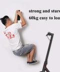 Person installing Heavy Duty Wall Mount Bike And E Scooter Hanger With Padded Tire Grooves No Fuss Install killer garage storage rack.
