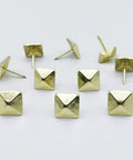 Real Deal Golden Square Upholstery Tacks Heavy Duty Shanks For Couch And Woodwork Revival 200 Pc Vintage Decorative Nail Kit on white background.
