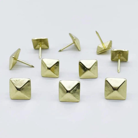 Real Deal Golden Square Upholstery Tacks Heavy Duty Shanks For Couch And Woodwork Revival 200 Pc Vintage Decorative Nail Kit on white background.