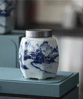 Classic Blue And White Ceramic Tea Jar Big Boy Airtight Loose Tea Storage Caddy For Kitchen Pantry Organization on countertop.