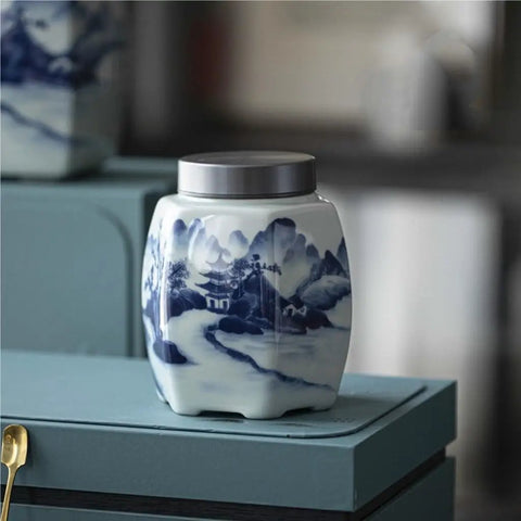 Classic Blue And White Ceramic Tea Jar Big Boy Airtight Loose Tea Storage Caddy For Kitchen Pantry Organization on countertop.