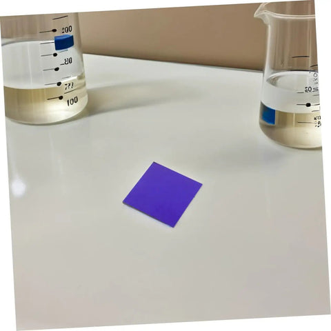 Must Have Set Of 2 Cobalt Glass Sheets 5x5cm for Chemistry Flame Color Reaction Tests, single glass sheet on lab table near beakers