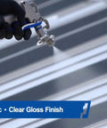 Heavy Duty Tough As Nails Clear Roof Sealer Stops Leaks Cold For Seven Years While Delivering Waterproof Armor For Metal Copper Concrete Roofs And Skylights In A Real Deal Five Gallon Size being sprayed on metal roof.
