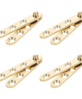 Copper Self Closing Pivot Door Hinges Set Of 8 With Concealed Top And Bottom Design in gold copper, showing four hinges aligned.