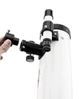 0.965 To 1.25 Inch Telescope Eyepiece Adapter With Secure Side Screw being attached to a telescope, showcasing vintage style.