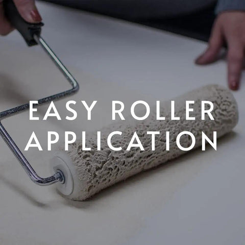Person using roller for Pro-732 Extra-Strength Clay Wallpaper Adhesive For Heavyweight Wall Coverings, 5 Gal, LEED Compliant