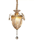 vhhob French Light Luxury Crystal Pendant Lamp Ceiling Hanging Fixture with golden details and clear glass shade.