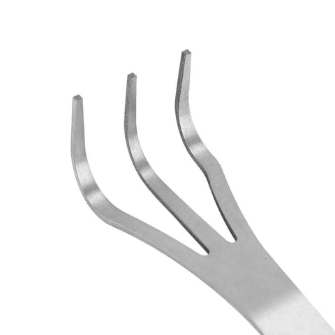 Close-up of three-prong stainless steel root rake for bonsai and garden soil loosening with ergonomic handle.
