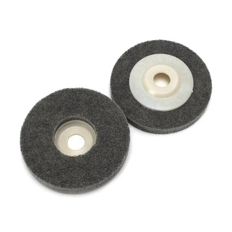 Two gray polishing wheels from Five Piece 4 Inch Gray Nylon Fiber Polishing Wheels Set With 16mm Bore For Metal Finishing And Surface Prep.