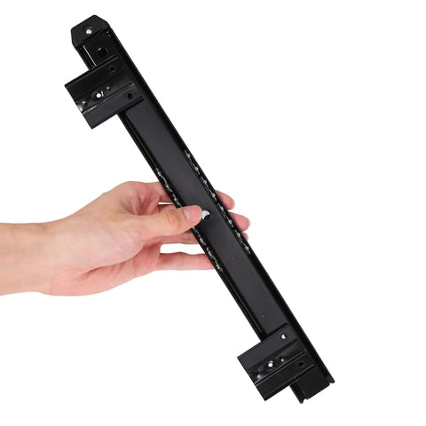 Heavy Duty Keyboard Tray Slide Rail For Computer Desk Runs Slick As Butter With Premium Glide Track Drawer Guide For Daily Typing And Solid Home Office Setup, hand holding black steel glide rail.