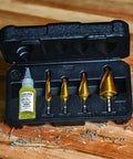 Heavy Duty Step Drill Bit Set For DIY With Spiral Double Fluted Titanium Nitride Coated Bits, Pro Grade Four Piece From Half Inch To One And Three Eighths Inch Sizes, Quarter Inch Shank, In Rugged Carry Case Klein Tools displayed in a black case.