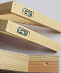 Heavy Duty L Shaped Corner Brackets For Walls with steel fittings, designed for strong shelf support on wooden surfaces.