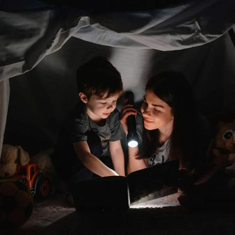 Mother reading to son with flashlight using L2 LED Bulb 2000 Lumen Drop In P60 Module For Flashlight Repair Replacement Cool White Light