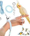 Parrot Flying Training Rope Kit With Five Size Bird Foot Rings For Cockatiels Parakeets Pigeons Outdoor Flying Kit Traction Rope Training Toy To Stop Escaping For Birds 3M Long showing a rope, foot rings, and a parrot on a hand.