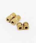 25 Pack Solid Brass Knurl Insert Nuts M2 M2.5 M3 Metric Threads Round Shape OD Options For Heavy Duty Projects And Tight Fits, close-up view of nuts.