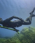 Diver using speargun with Spearfishing Reel With 130 Ft Line For Serious Big Fish Hunts Durable Non Corrosive Plastic Dovetail Mount