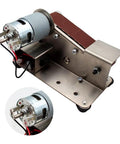 Knockout Mini Belt Sander And Slick Dual Voltage Polisher With Tough Fixed Angle Grinding Wheel For Swift Knife Sharpening And No Sweat Diy Jobs Powered By Zippy 775 Motor Workhorse For Tradesmen showing metal construction and motor.
