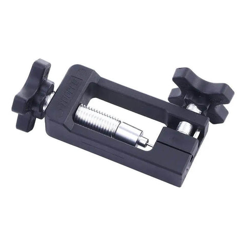 Close-up of Bike Disc Brake Olive Connector And Needle Driver Kit with metal and nylon components on white background.