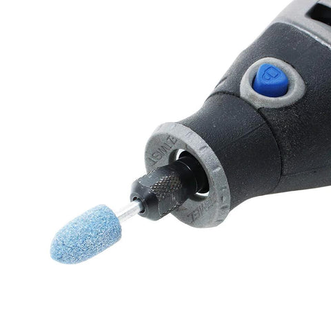 Rotary tool with 1/8-inch shank mounted abrasive grinding stone (blue-grit) in the chuck, side view.