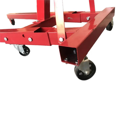 Close-up of Heavy Duty 2 Ton 4000 Lbs Engine Hoist Cherry Picker's steel frame and caster wheels for stability.