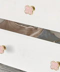 Sweet Looking Pink Clover Drawer Knobs Six Pack For Dressers And Kitchen Cupboards Smooth Zinc Alloy Hardware on white dresser.
