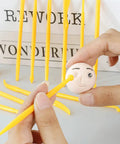Hands using 14 Piece Clay Carving Set For Pottery And Sculpting DIY Plastic Polymer Modeling Tools Kit With Comfortable Grips Ideal For Newbies Perfect For Carving Molding Embossing on clay face.