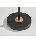 Base of Arlo Tree Floor Lamp, black finish with brass accent, part of 67.25 inch tall modern mid-century style design