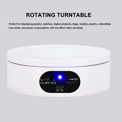 Motorized 360 Degree Rotating Turntable Stand For Jewelry Photography with power button and smooth surface.