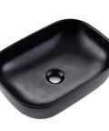 Black Rectangle Vessel Sink 18x13 Above Counter Porcelain Ceramic With Faucet And Drain Combo Dope Durable Porcelain Triple Glaze Finish Scratch Resistant Modern Bathroom Vessel Basin. Close-up view of the sink's glossy black finish.